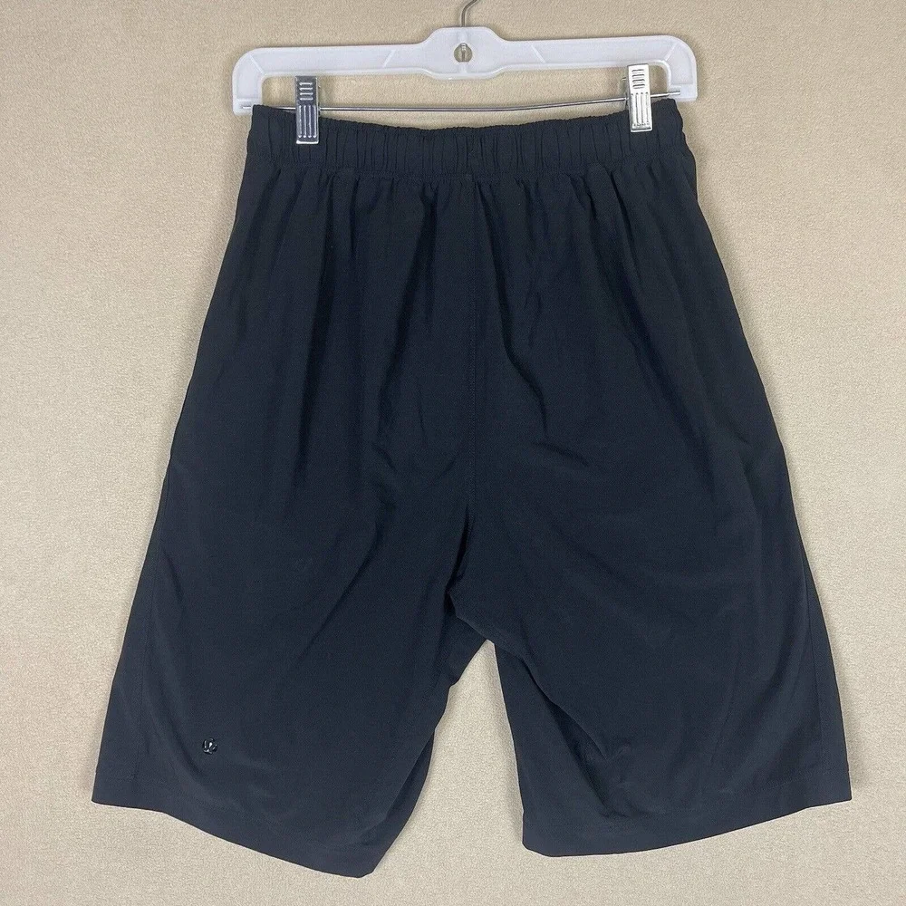 Lululemon Mens XS Black Athletic‎ Shorts Faux Leather Pockets Elastic Waist Logo